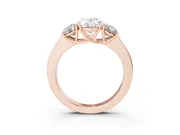 Three-Stone Oval Cut Diamond Ring Set in Rose gold with Matching Prong Settings and Plain Band