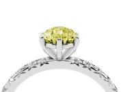 Fancy Yellow Pear Cut Diamond Pavé Solitaire Ring Set in Platinum with Round Band and Prong Setting