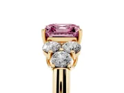 Fancy Pink Asscher Cut Diamond Cluster Ring Set in Yellow gold with Round Accent Stones and Prong Setting on a Plain Band