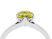 Fancy Yellow Emerald Cut Diamond Solitaire Ring Set in White gold with Polished Tapered Band and Prong Setting