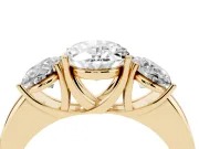 Oval Cut Diamond Three-Stone Ring Set in Yellow gold with Bold Center and Classic Band