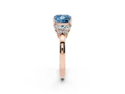 Fancy Blue Princess Cut Diamond Solitaire Floral Ring Set in Rose gold with Marquise Petals and Prong Setting