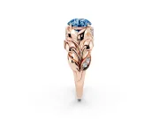 Fancy Blue Round Cut Diamond Leaf-Inspired Engagement Ring Set in Rose gold with Round Accents