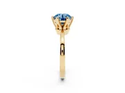 Fancy Blue Round Cut Diamond Solitaire Engagement Ring Set in Yellow gold with Slim Tapered Solitaire Band