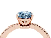 Fancy Blue Oval Cut Diamond Solitaire Ring Set in Rose gold with Twisted Band and Bead Prong Setting