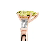Fancy Yellow Pear Cut Diamond Solitaire Ring Set in Rose gold with Tapered Baguette Accents and Prong Setting