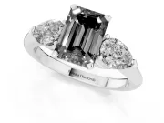 Fancy Black Three-Stone Emerald Cut Diamond Ring Set in White gold with Pear Side Stones and Prong Setting