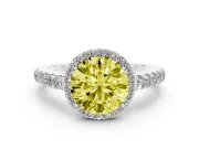 Fancy Yellow Round Cut Diamond Halo Engagement Ring Set in White gold with Pavé Band and Prong Setting