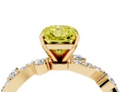 Fancy Yellow Radiant Cut Diamond Solitaire Twisted Band Set in Yellow gold with Pavé Setting