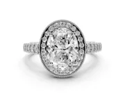 Oval Cut Diamond Milgrain Halo Solitaire Ring Set in Silver with Bezel Set Side Stones and Pavé Band