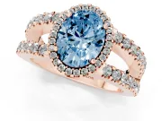 Fancy Blue Oval Cut Diamond Halo Ring Set in Rose gold with Pavé Split Shank and Prong Setting