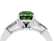 Fancy Green Emerald Cut Diamond Solitaire Ring Set in Platinum with Tapered Baguette Accents and Prong Setting