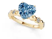 Fancy Blue Heart Cut Diamond Solitaire Ring Set in Yellow gold with Bezel-Set Accents on Beaded Band and Prong Setting