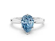 Fancy Blue Pear Cut Diamond Solitaire Engagement Ring Set in White gold with Slim Tapered Solitaire Band