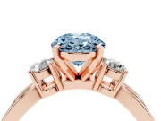 Fancy Blue Three-Stone Oval Cut Diamond Twist Band Ring Set in Rose gold with Pavé Accents and Prong Setting