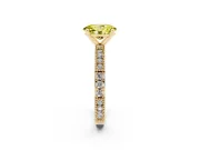 Fancy Yellow Oval Cut Diamond Solitaire Ring Set in Yellow gold with Slim Pavé Band and Prong Setting