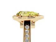 Fancy Yellow Pear Cut Diamond Halo Solitaire Ring Set in Yellow gold with Pavé Band and Bezel Setting