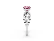Fancy Pink Round Cut Diamond Solitaire Ring Set in Silver with Side Stones on Criss-Cross Band and Prong Setting