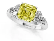 Fancy Yellow Asscher Cut Diamond Cluster Ring Set in Silver with Round Accent Stones and Prong Setting on a Plain Band