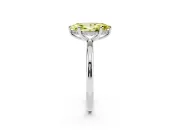 Fancy Yellow Marquise Cut Diamond Solitaire Ring Set in Platinum with Thin Band and Prong Setting