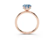 Fancy Blue Heart Cut Diamond Solitaire Ring Set in Rose gold with Thin Band and Prong Setting