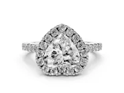 Heart Cut Diamond Halo Pavé Solitaire Ring Set in Platinum with Prong-Set Center Stone