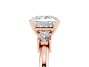 Three-Stone Princess Cut Diamond Ring Set in Rose gold with Prong Setting and Plain Band