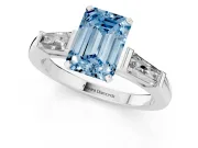 Fancy Blue Emerald Cut Diamond Solitaire Ring Set in Silver with Tapered Baguette Side Stones and Prong Setting