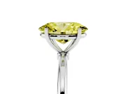 Fancy Yellow Oval Cut Diamond Solitaire Engagement Ring Set in Platinum with Thin Band and Prong Setting