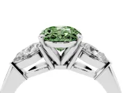 Fancy Green Three-Stone Oval Cut Diamond Ring Set in White gold with Pear Side Stones and Prong Setting