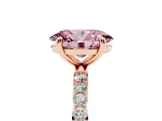 Fancy Pink Oval Cut Diamond Solitaire Ring Set in Rose gold with Round Pavé Band and Prong Setting