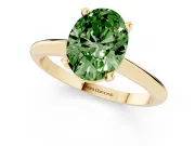 Fancy Green Oval Cut Diamond Solitaire Ring Set in Yellow gold with Prong Setting on a Plain Round Band