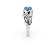 Fancy Blue Round Cut Diamond Leaf-Inspired Engagement Ring Set in White gold with Round Accents