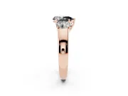 Pear-Shaped Three Stone Engagement Ring Setting for a Black Center | Rose Gold