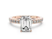 Emerald Cut Diamond Solitaire Set in Rose gold with Round Pavé Band and Prong Setting