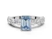 Emerald Cut Side Stone Engagement Ring Setting for a Fancy Blue Lab-Grown Diamond | Scalloped Prong Accents | Platinum