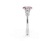 Fancy Pink Three-Stone Oval Cut Diamond Ring Set in Silver with Pear Side Stones and Prong Setting