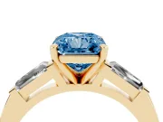 Fancy Blue Radiant Cut Diamond Solitaire Ring Set in Yellow gold with Tapered Baguette Side Stones and Prong Setting