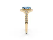 Fancy Blue Oval Cut Diamond Milgrain Halo Solitaire Ring Set in Yellow gold with Bezel Set Side Stones and Pavé Band