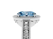 Fancy Blue Oval Cut Diamond Halo Ring Set in Platinum with Round Accent Halo, Pavé Band and Prong Setting