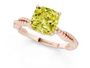 Fancy Yellow Cushion Cut Diamond Solitaire Ring Set in Rose gold with Twisted Band and Bead Prong Setting