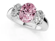 Fancy Pink Three-Stone Oval Cut Diamond Ring Set in White gold with Matching Prong Settings and Plain Band