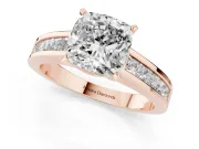 Cushion Cut Diamond Solitaire Ring Set in Rose gold with Channel-Set Band and Prong Setting