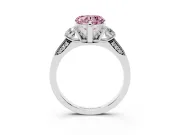Fancy Pink Heart Cut Diamond Three-Stone Ring Set in Platinum with Pavé Band and Smaller Side Stones