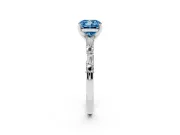 Fancy Blue Cushion Cut Diamond Solitaire Set in White gold with Side Baguettes and Channel Set Band