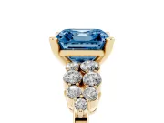 Fancy Blue Asscher Cut Diamond Cluster Engagement Ring Set in Yellow gold with Pavé Band and Prong Setting
