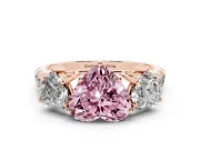 Fancy Pink Heart Cut Diamond Three-Stone Ring Set in Rose gold with Pavé Band