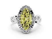 Fancy Yellow Marquise Cut Diamond Halo Ring Set in White gold with Scrollwork Band and Prong Setting