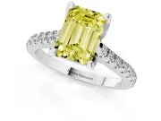 Fancy Yellow Emerald Cut Diamond Solitaire Ring Set in Platinum with Brilliant Pavé Band and Prong Setting
