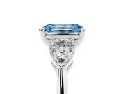 Fancy Blue Three-Stone Emerald Cut Diamond Ring Set in Platinum with Pear Side Stones and Prong Setting